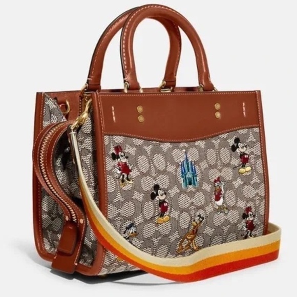 Coach Handbags - Coach Brown and Tan Crossbody Bag with Disney Design
